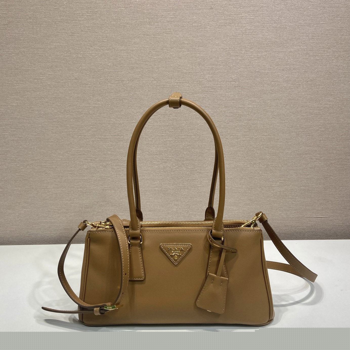 Pra*a top handle bags